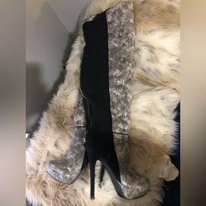 Black, white and a charcoal gray color thigh high boot